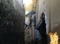 charred insulation in wall.jpg