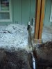 Resized_washer drain line running out of laundry room 2.jpg