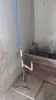 water line entering house with check valve.jpg