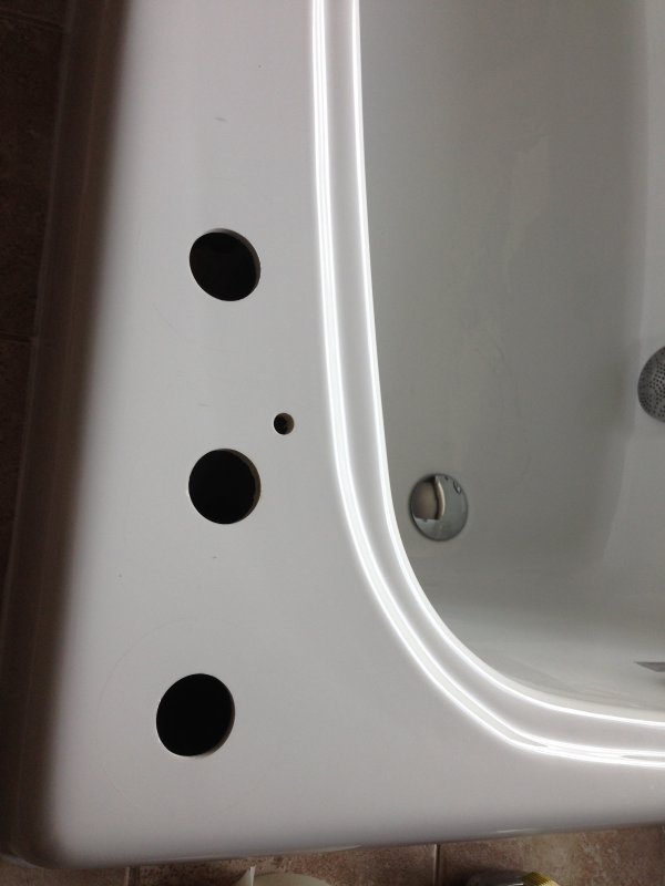 Tub faucet holes.jpg