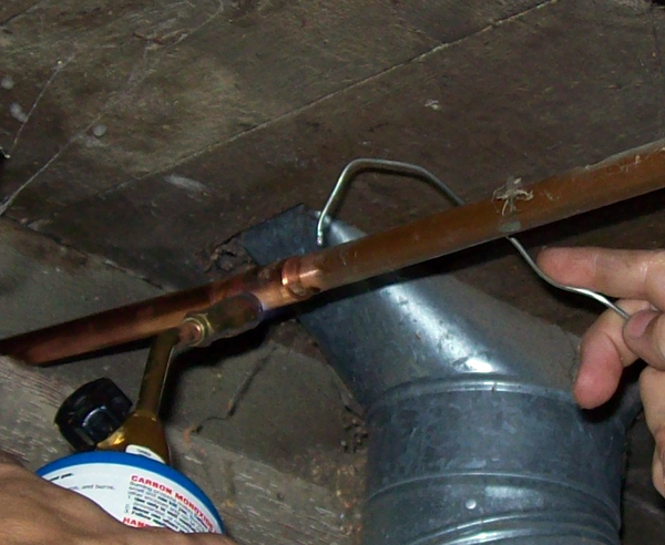sweating-the-copper-coupling.jpg