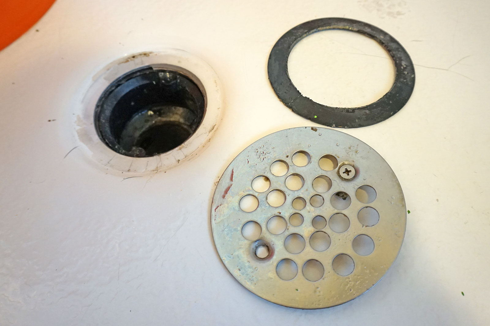 How to Remove a Shower Drain Cover