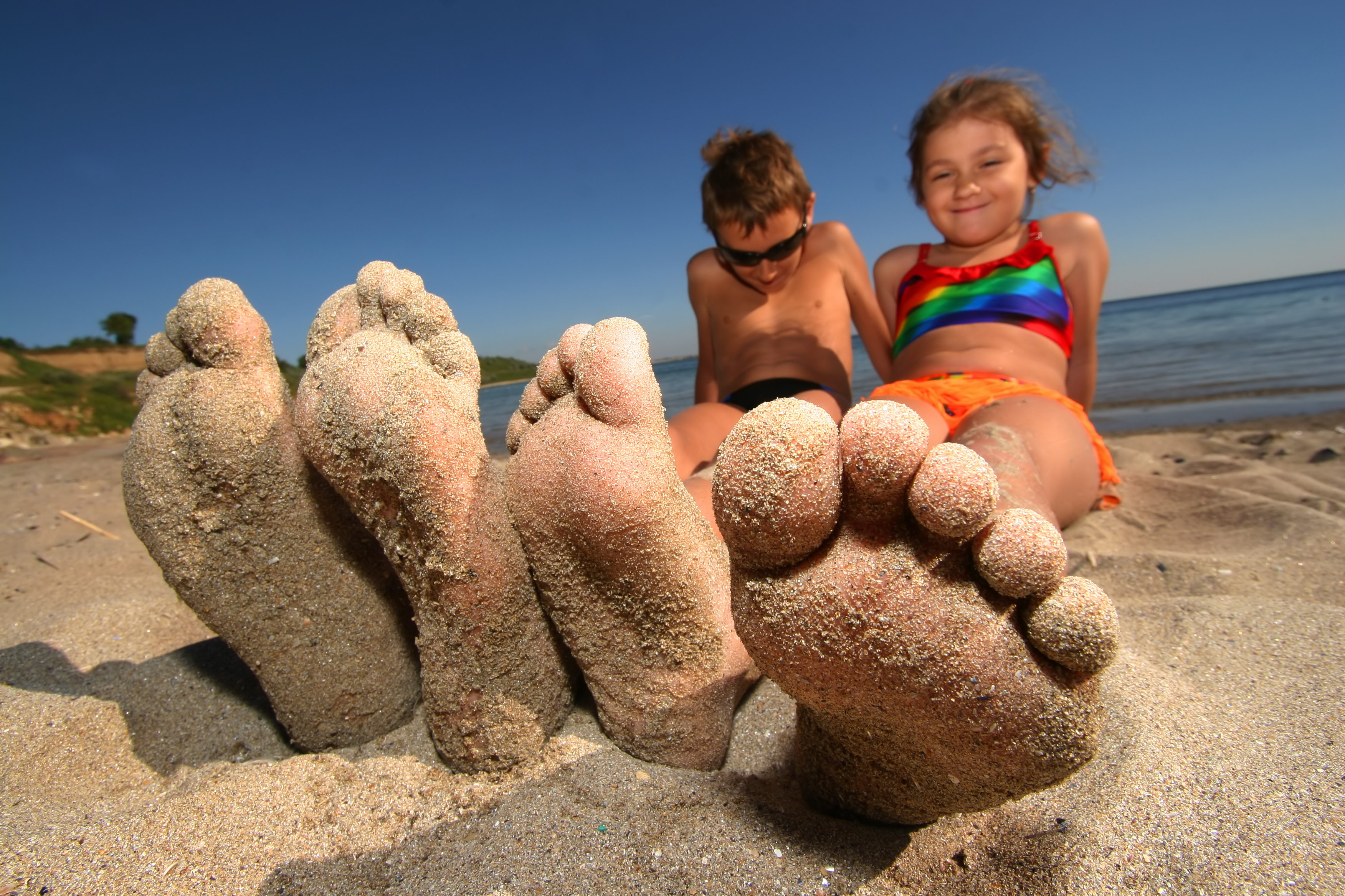 sandy-feet-at-beach.jpg