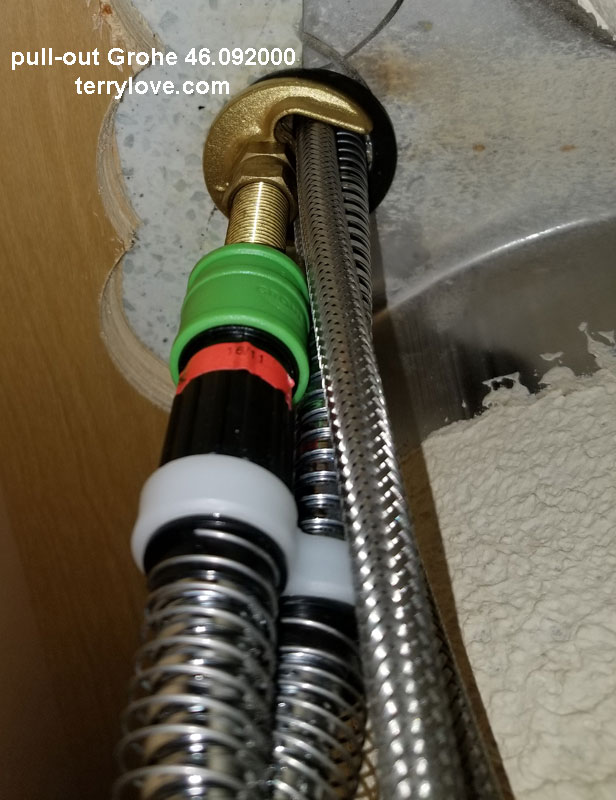 Grohe kitchen pull-out spout leak. Water in the cabinet ...