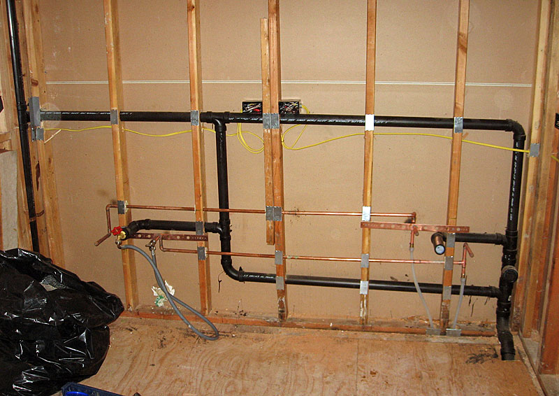 plumbing for two sinks in bathroom