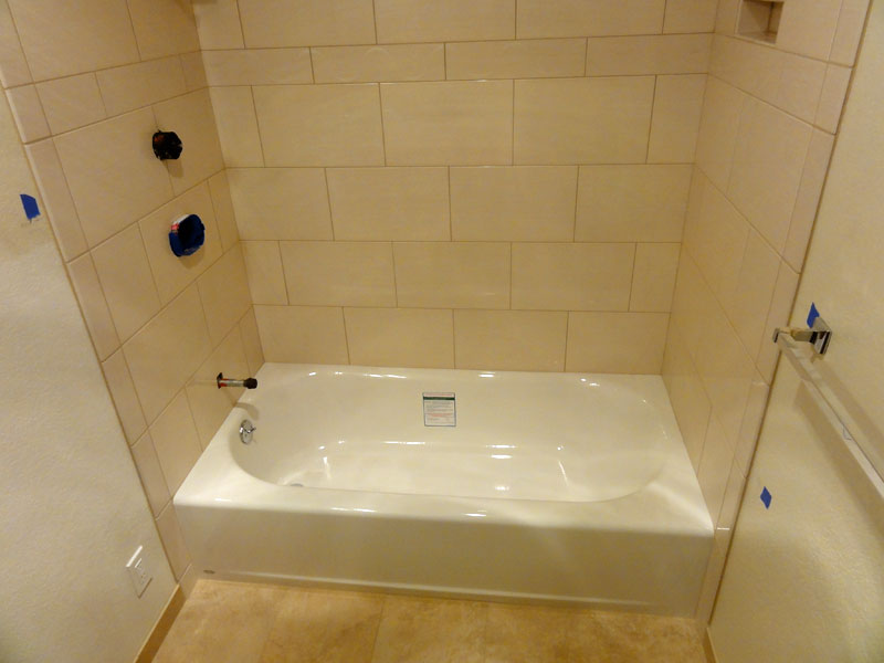 bathtub creaks when standing in it