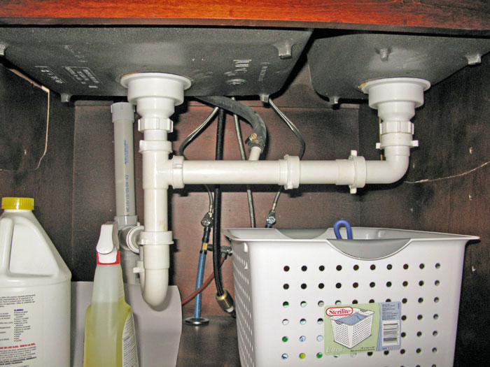 Dishwasher under best sale sink plumbing