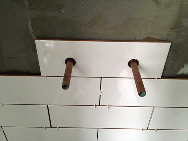 bathroom-installation-drilling-holes-tiles.jpg