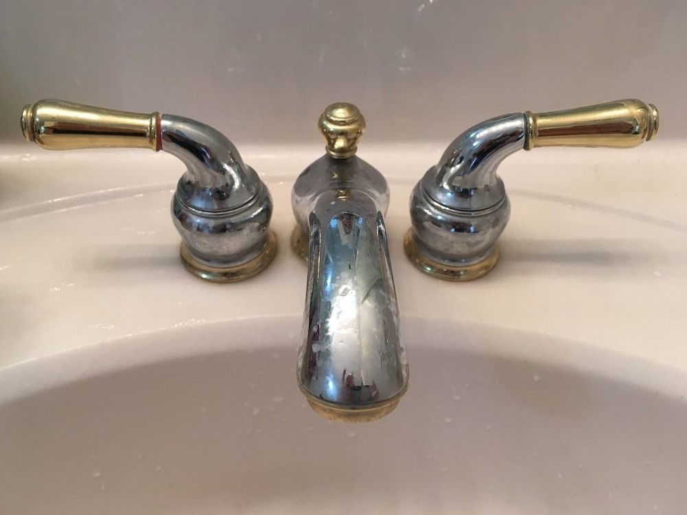 removing old moen bathroom sink faucet
