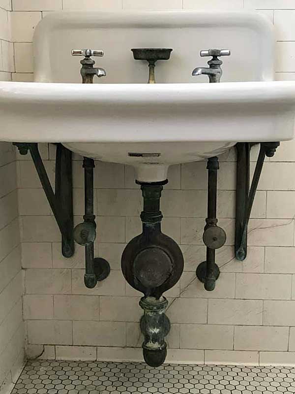 how to support a wall mounted sink